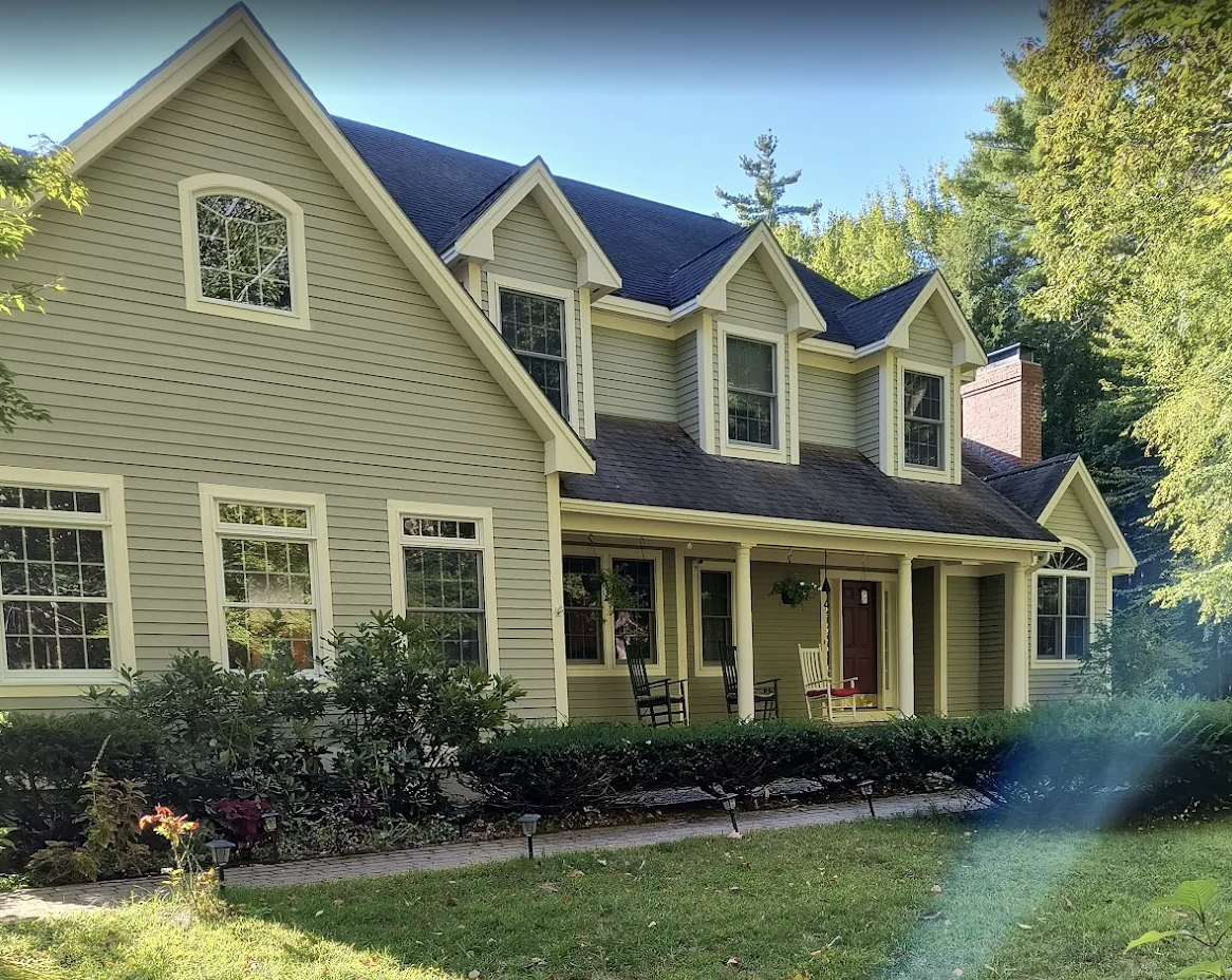 Exterior painting completed — trim detail